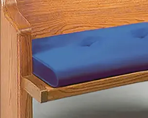 A mockup of a roll front cushion on a pew